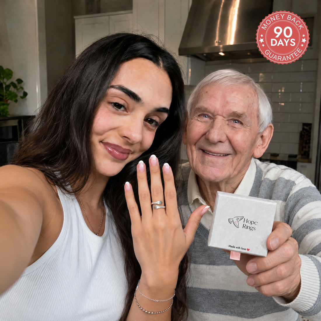 A granddaughter showing her Hug Ring next to her grandpa
